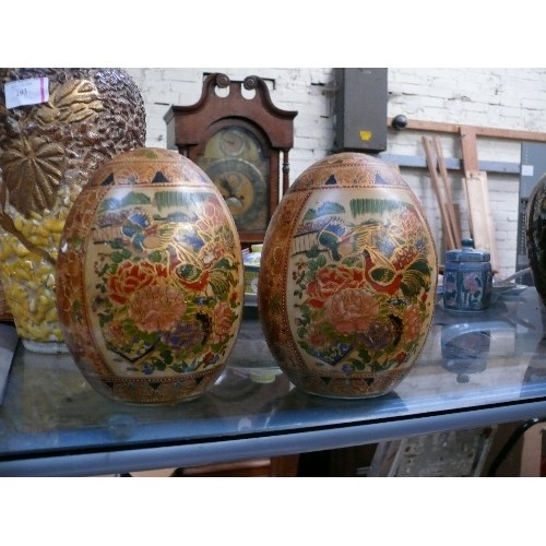 190 - Pair of Satsuma type oriental ceramic eggs, hand decorated with pheasants and flowers - 18cm