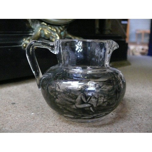 9 - An unusual  small 19th Century glass jug finely painted in shades of grey with couples in a pastoral... 