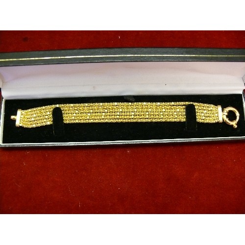 31C - A FINE SOLID SILVER BRACELET WITH GOLD PLATING HIGH FASHION ITALIAN DESIGN 6 CHAINS JOINED TO ONE