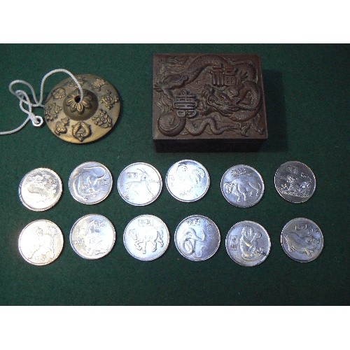 3 - Vintage tin with Chinese dragon design to lid containing a set of 12 Chinese Zodiac animal coins & s... 