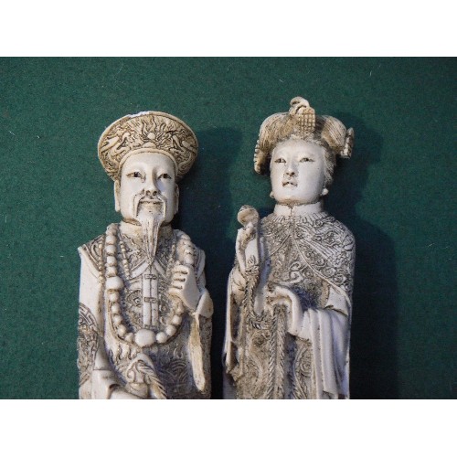 195A - A pair of Chinese resin figures of an Emperor and Empress, simulating ivory, 26cm H.