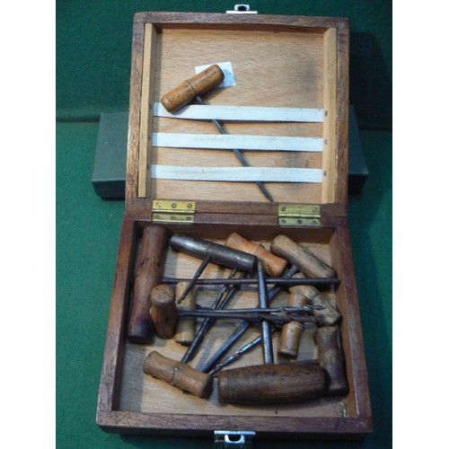 238 - A vintage box full of old wooden and metal handled twist gimlet tools. The lot also includes classic... 