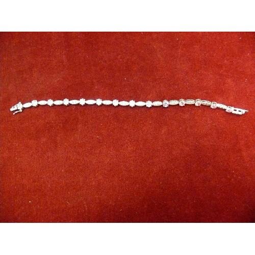 31K - A SOLID SILVER BRACELET WITH PINK AND WHITE CRYSTALS