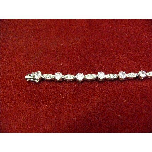 31K - A SOLID SILVER BRACELET WITH PINK AND WHITE CRYSTALS