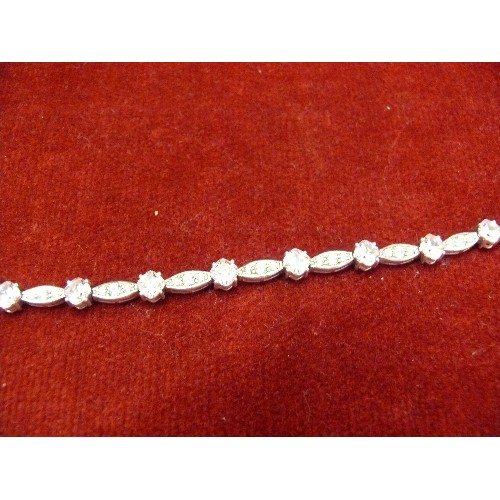 31K - A SOLID SILVER BRACELET WITH PINK AND WHITE CRYSTALS