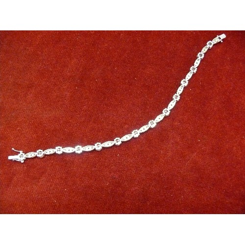 31K - A SOLID SILVER BRACELET WITH PINK AND WHITE CRYSTALS