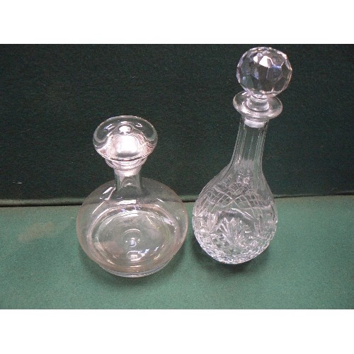 100A - A Wedgwood Lead crytsal decanter and a further heavy crystal decanter