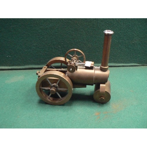 131 - Vintage 20th Century precision made metalwork models including a traction engine and a steam locomot... 