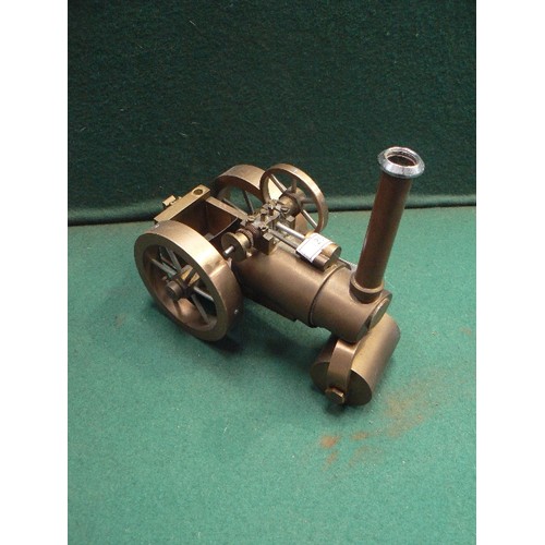 131 - Vintage 20th Century precision made metalwork models including a traction engine and a steam locomot... 