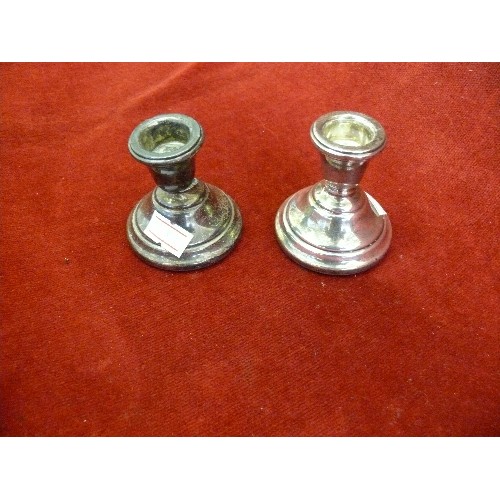 40 - A pair of sterling silver candlesticks, hallmarked Birmingham  1970 - 7cm h