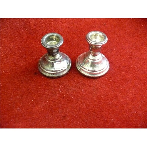 40 - A pair of sterling silver candlesticks, hallmarked Birmingham  1970 - 7cm h