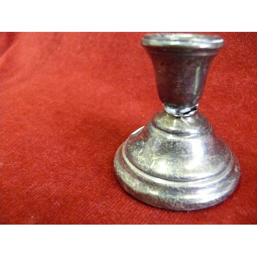 40 - A pair of sterling silver candlesticks, hallmarked Birmingham  1970 - 7cm h