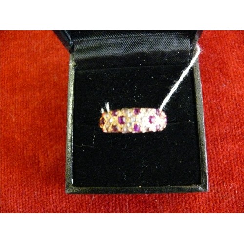 23B - A beautiful 18ct gold ring with 10 rubies and 15 diamonds. 1 diamond missing. 3.9 grams size O.