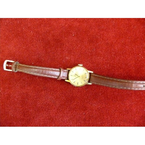 18 - Ladies gold plated Omega 485 watch on a leather strap. The inside of the case marked Plaque Or G20 M... 