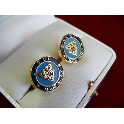 36 - Pair of cufflinks with enamelled fronts marked 