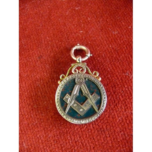 19 - A 9ct Gold Freemasons locket or fob with square & compasses symbol set with bloodstone. Suitable for... 