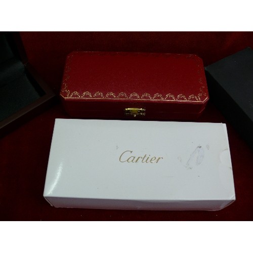 21 - Two luxury brand boxes;  Cartier pen box with booklet in red and gilt with outer box and Audemars Pi... 