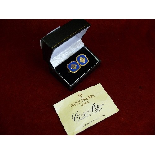 24 - Pair of Patek Philippe Switzerland cufflinks in blue enamel and gilt, with certificate and box