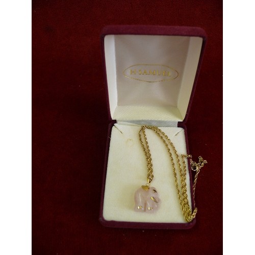 71 - Rose quartz elephant pendant on gold plated chain