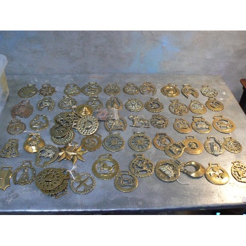 358 - Crate of over 60 single horse brasses, cast and stamped, some 19th Century.