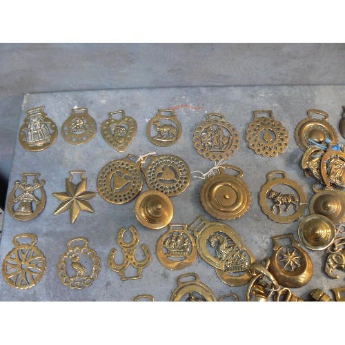 369 - Crate of over 100 antique and 20th Century horse brasses, both cast & stamped. All types.