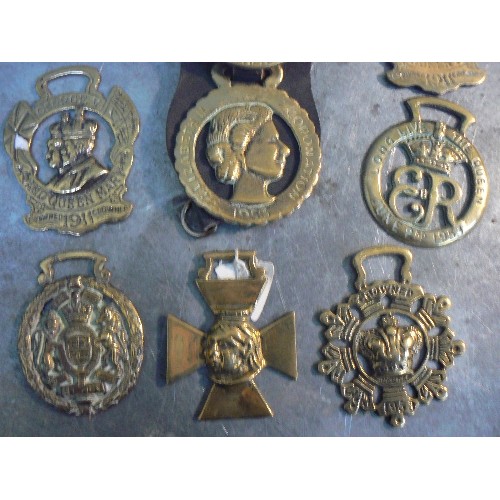 376 - 11 x royalty themed horse brasses including Queen Victoria cross, a well cast George V coronation 19... 