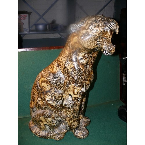 84 - A large floor standing big cat figure, lioness with decoupage type decoration of African safari wild... 