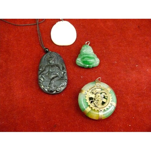 69 - Four 20th Century Chinese carved pendants including a jade buddha, a jade disc with brass dragon det... 