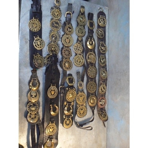 378 - 10 good martingale and display straps with mostly 19th and early 20th century horse brasses. Include... 