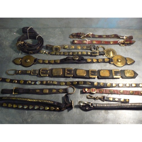 379 - Good lot of studded bridle straps including a double ended loin strap terminating in dome centred br... 