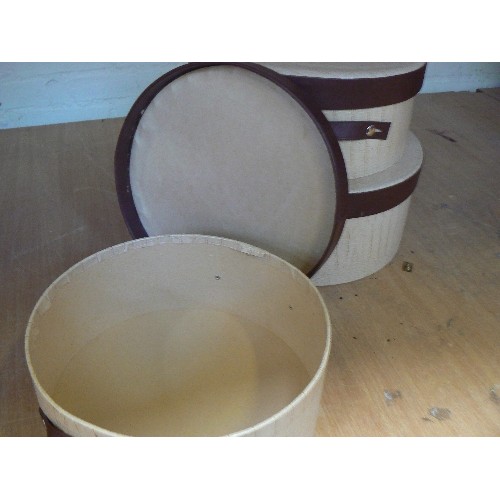 339 - A graduated set of 3 hat boxes in fawn 