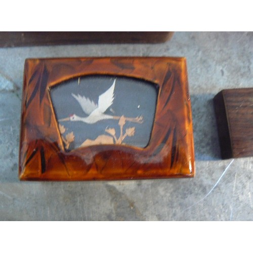 74 - Four vintage boxes including a 19th Century papier mache stamp box the lid decorated with an eagle a... 