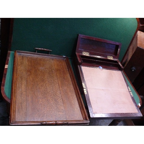 334 - An Edwardian oak tray and a writing slope or clerk's desk with internal drawers and pen box