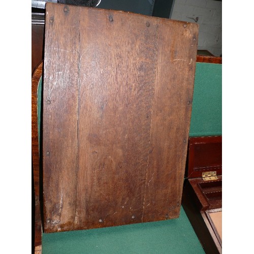 334 - An Edwardian oak tray and a writing slope or clerk's desk with internal drawers and pen box