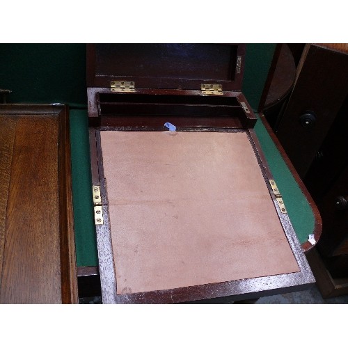 334 - An Edwardian oak tray and a writing slope or clerk's desk with internal drawers and pen box