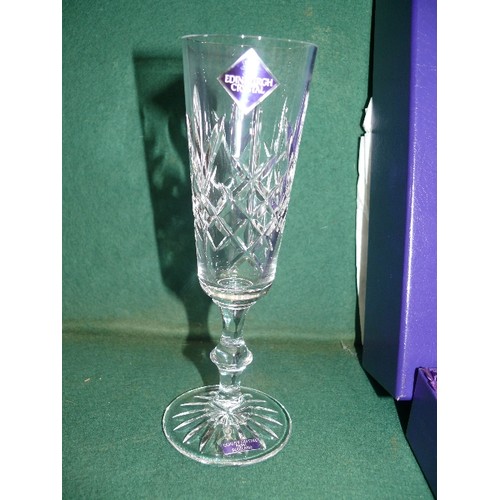 114 - A pair of Champagne Flutes by Edinburgh Crystal in their original box