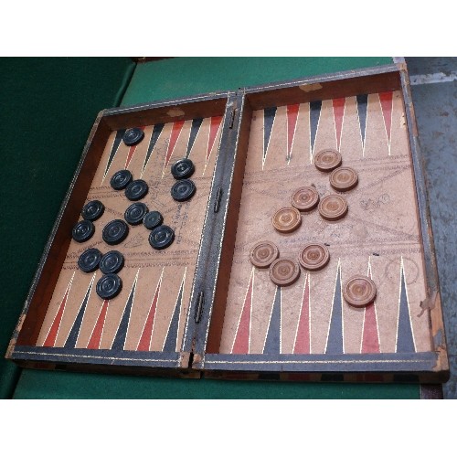 335 - Early 20th Century folding backgammon board - folds into the shape of two leather bound books- some ... 