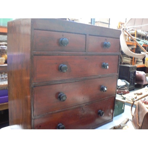 400 - A Victorian pine two over three chest of drawers in mahogany colour with stencilled decoration aroun... 