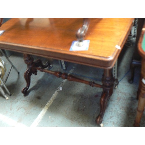 406 - A mid Victorian mahogany side table with turned stretcher on original white pot castors (1 wheel mis... 