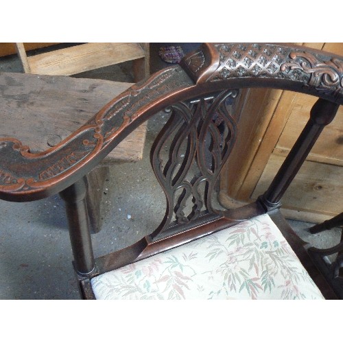 408 - A late 19th Century corner chair with exceptional quality carving on the back splats and top rail, i... 