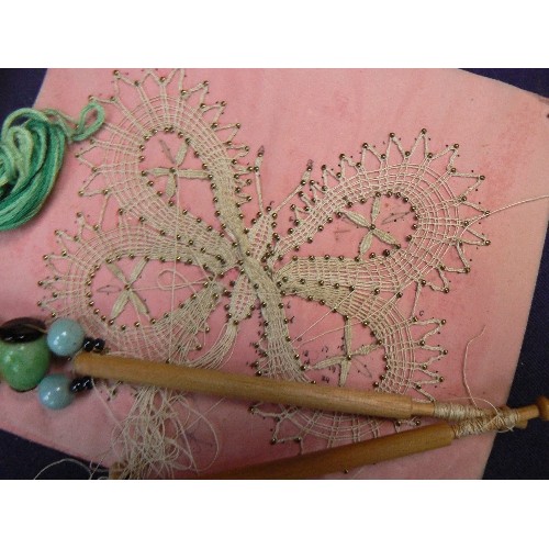 343 - Vintage lace pillow with wooden bobbins & spangles together with threads.