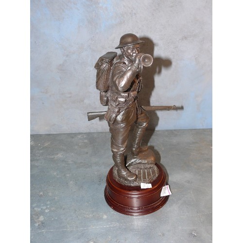 213 - A cold cast resin bronze of a WW1 Canadian soldier 