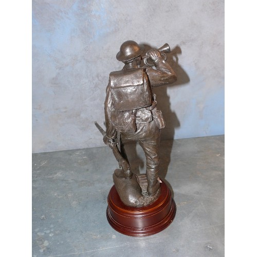 213 - A cold cast resin bronze of a WW1 Canadian soldier 