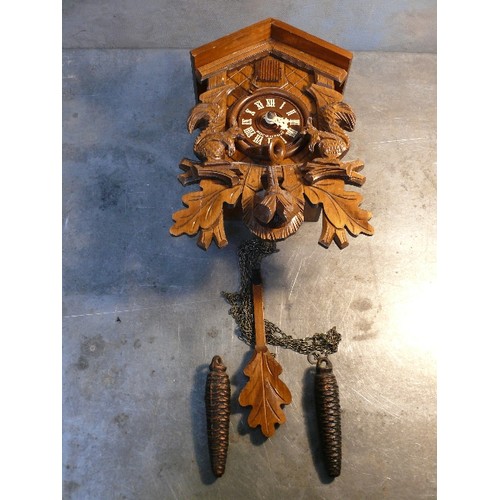 418B - Vintage Black Forest cuckoo wall clock. The movement by Herbert Herr Triberg, Germany. The case carv... 