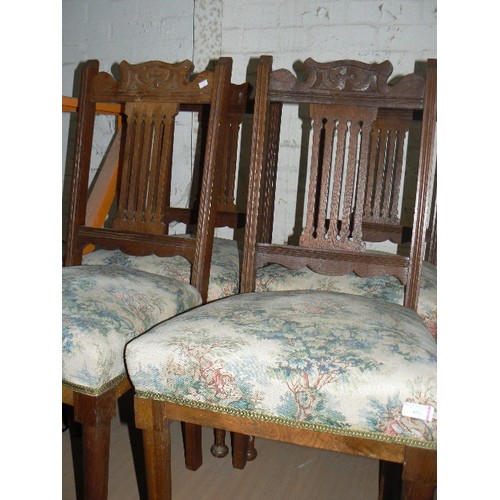 426 - Set of 4 Arts & Crafts oak dining chairs with sprung seats, carving to top rail