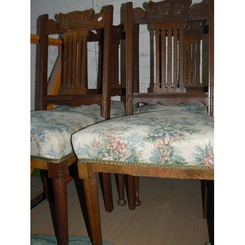 426 - Set of 4 Arts & Crafts oak dining chairs with sprung seats, carving to top rail