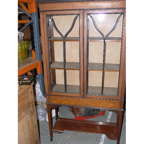 409 - An Edwardian mahogany display cabinet with astragal glazed doors, boxwood stringing, raised on four ... 