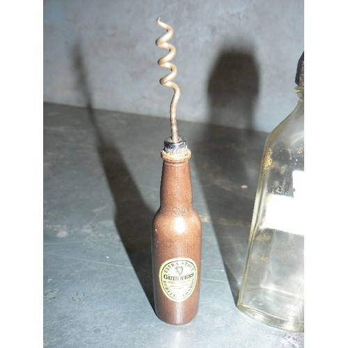 136B - Advertising collectables including two miniature Guinness bottles with contents, a Guinness corkscre... 