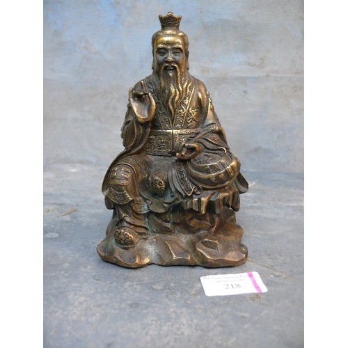 218 - A well cast patinated brass or bronze figure of a Taoist God, Tai Shang Lao Jun - 17cm h.