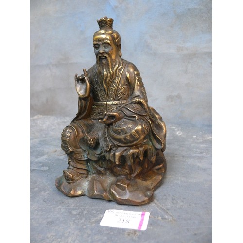 218 - A well cast patinated brass or bronze figure of a Taoist God, Tai Shang Lao Jun - 17cm h.